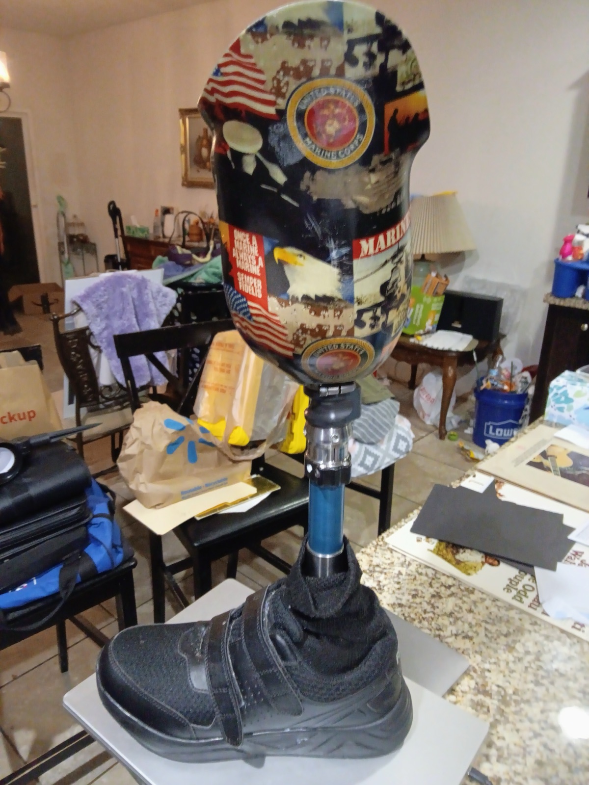 Eddie Lee's prosthetic leg wrapped in a U.S. Marine Corps design